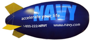 17' giant advertising blimp, helium fill or air fill, great for trade show display, giant advertising blimps can be decorated with 1 color up to full color. Click here for more pictures of decorated advertising blimps. Click below for pics descriptions, prices and to buy 17' advertising blimps.