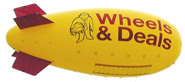 24' giant outdoor advertising blimp, helium filled, great for retail stores, car dealerships, giant advertising blimps can be decorated with 1 color up to full color. decorated advertising blimps. Click here for pics descriptions, prices and to buy 24' outdoor advertising blimps.